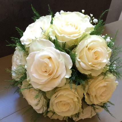 Flowers. Bridal bouquet of white roses.

A wedding is a special event and each bridal bouquet is an individually made work