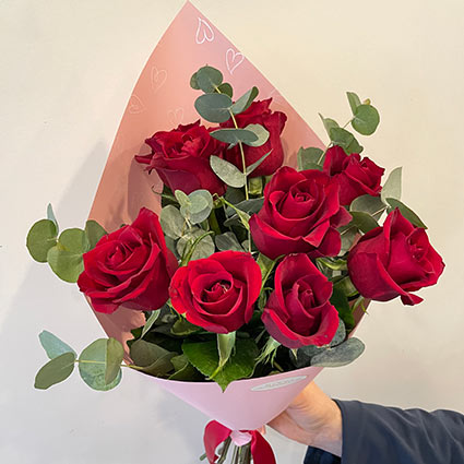 Red roses with eucalyptus