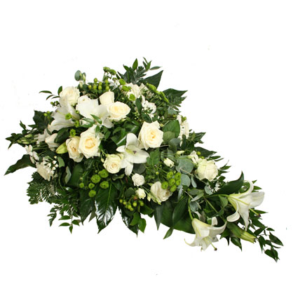 Flower delivery Riga. Funeral flower arrangement of white lilies, white roses, white lisianthus, white and green