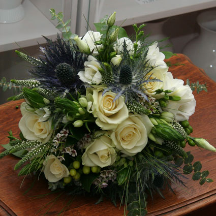 Flowers. Bridal bouquet of white flowers.

A wedding is a special event and each bridal bouquet is an individually made