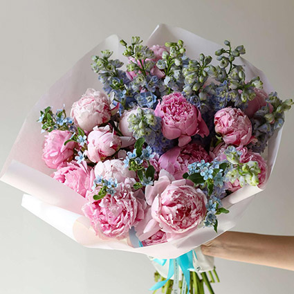 Summer flower bouquet with peonies