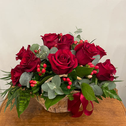 Small basket of red roses